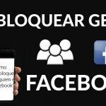 Hand holding phone showing instructions on how to unblock someone on Facebook. 